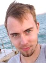 Photo of Bohdan Mykhailenko , smiling man, short spiky brown hair