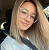 Photo of Mariia Razno, smiling woman, long straight light brown hair